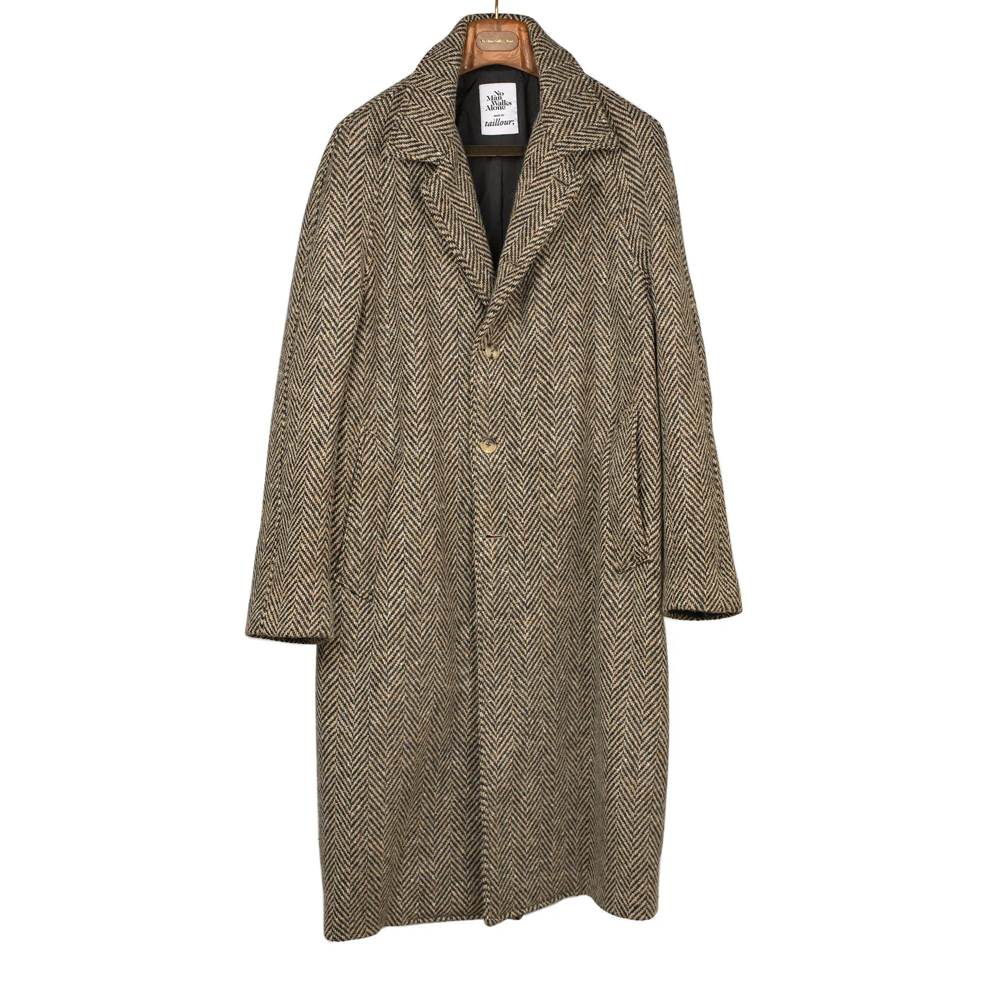 Belted balmacaan coat in handloomed Donegal oatmeal-black herringbone tweed