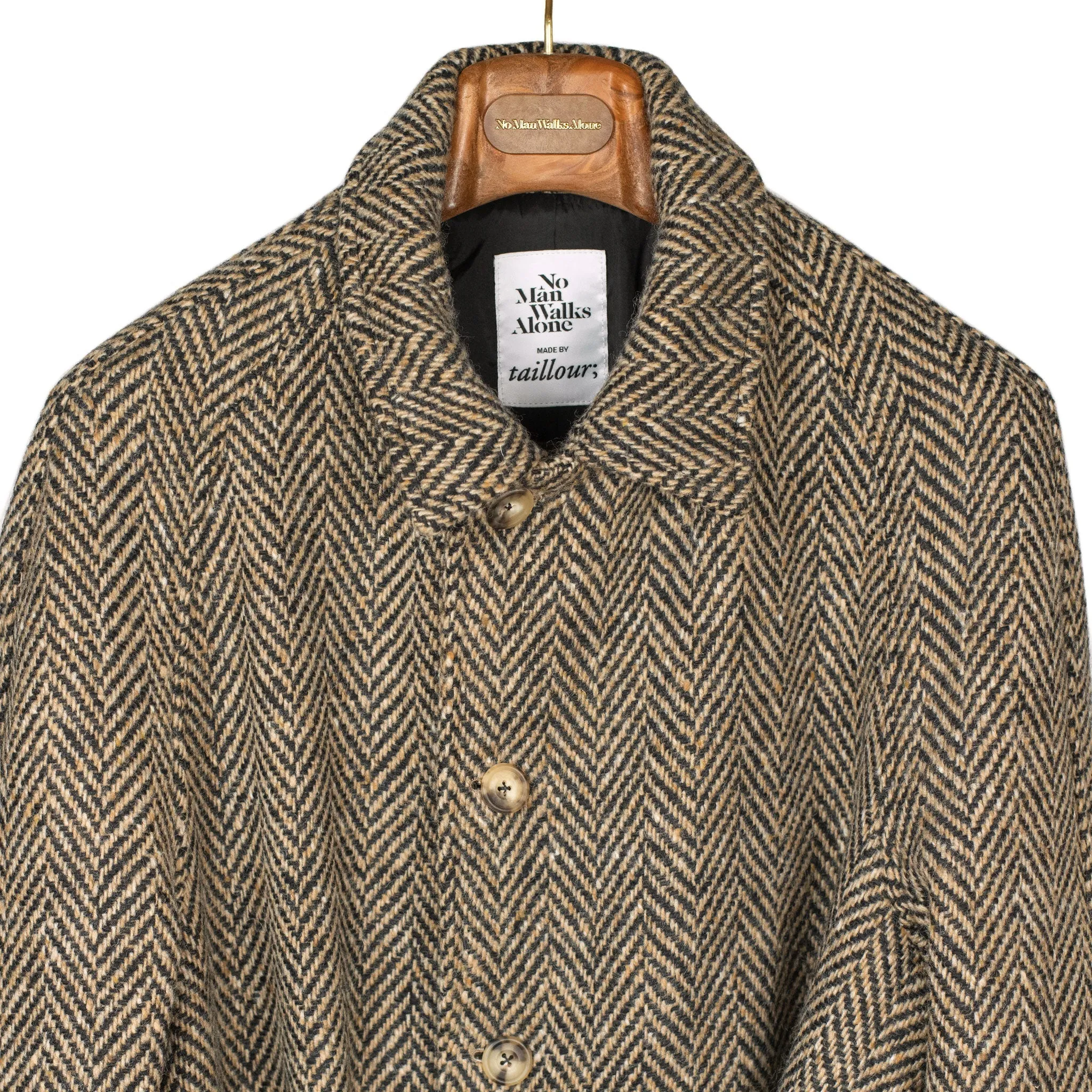 Belted balmacaan coat in handloomed Donegal oatmeal-black herringbone tweed