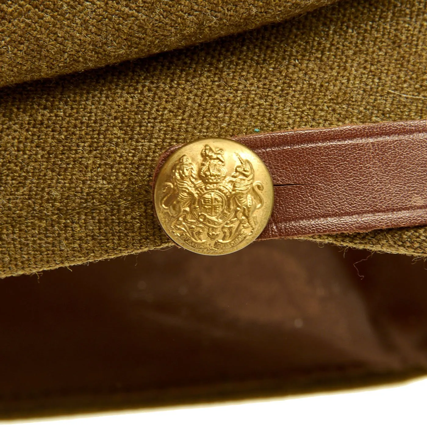 Original British WWII Khaki Lincolnshire Regiment Officers Visor Cap by Townend in size 7 3/4